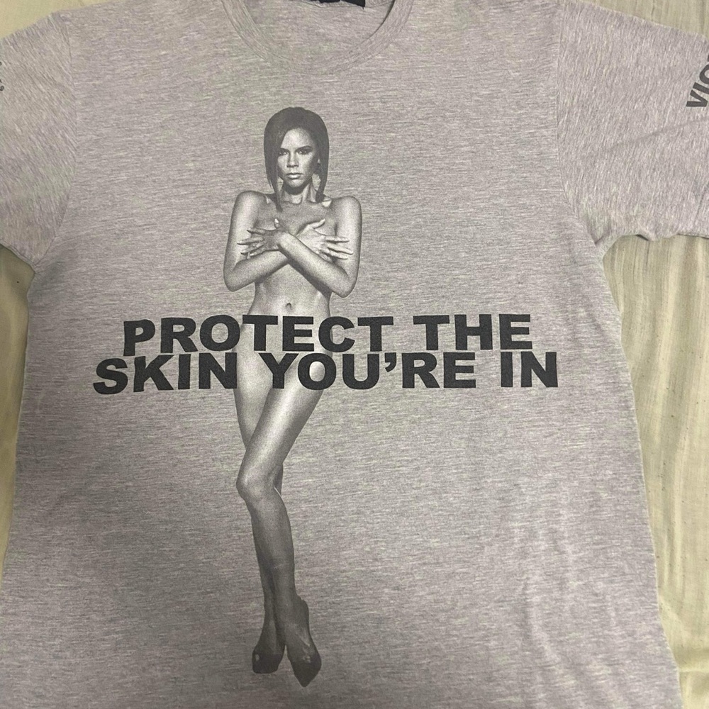 RARE MARC JACOBS PROTECT THE SKIN YOU’RE IN TEE
